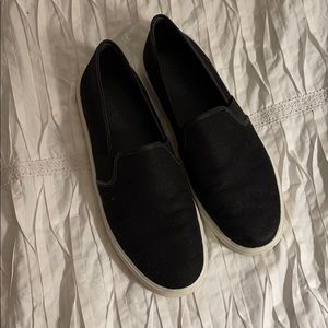 Black slip on sneakers